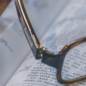 Glasses on Bible